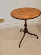 A George III Style Mahogany Wine Table The Circular Top Raised On A Carved Pedestal On Triform