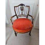 An Edwardian Mahogany And Bone Inlaid Low Armchair With Pierced Splat And Bowed Arms The Circular