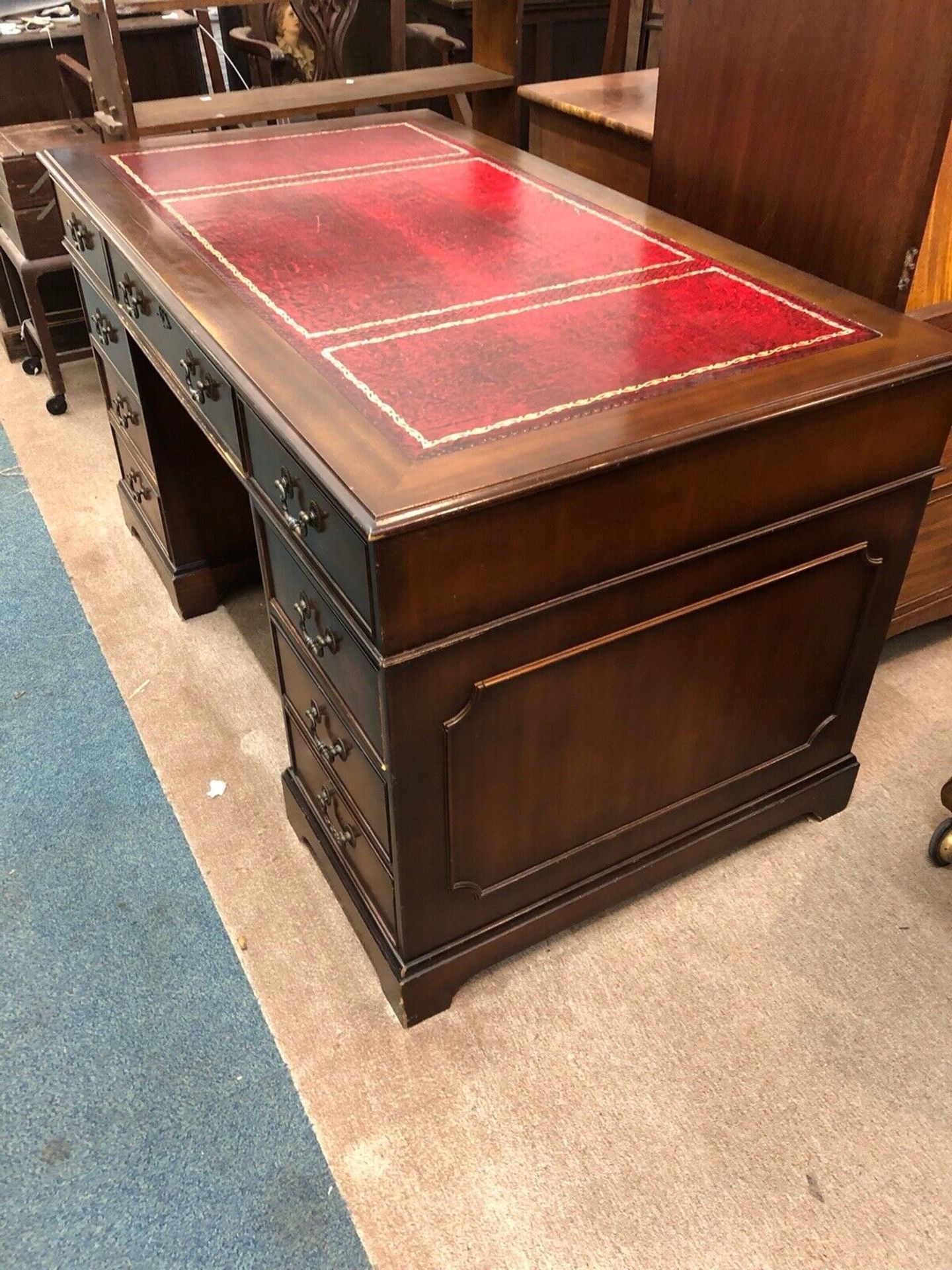 George III style mahogany pedestal desk. The rectangular top with a red leather and tooled insert, - Image 4 of 7