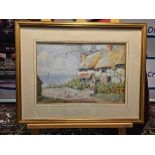 A Signed Watercolour HORACE HAMMOND, Young Woman Feeding Birds Before A Coastal Cottage Signed And