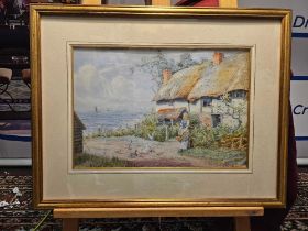 A Signed Watercolour HORACE HAMMOND, Young Woman Feeding Birds Before A Coastal Cottage Signed And