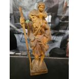 A Large Carved Wooden Figurine St Christopher