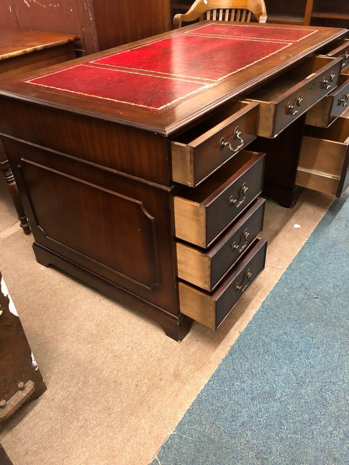 George III style mahogany pedestal desk. The rectangular top with a red leather and tooled insert, - Image 2 of 7