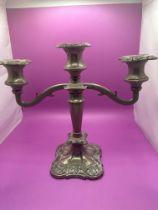 A Pair Of Silver Plated Candelabraâ„¢s Made In England 25cm