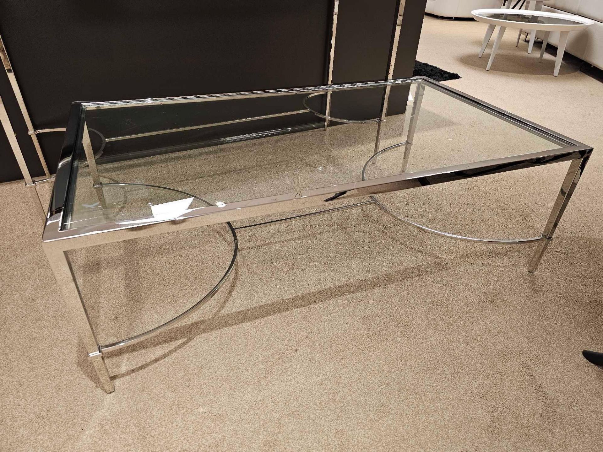 Tokyo Coffee Table by Kesterport The Tokyo coffee table with its clear glass top and a refined