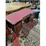 A Twin Pedestal Mahogany Desk Shaped Top Adorned With A Finely Tooled Leather Inset With Central