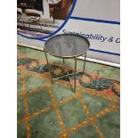 Gallery Contemporary Round Metal Tray Table Dimensions: 43cm x 55cm Finish: Silver and Grey
