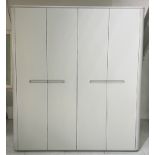 Florence Four Door Wardrobe This stylish four door wardrobe comes in a grey gloss lacquer finish