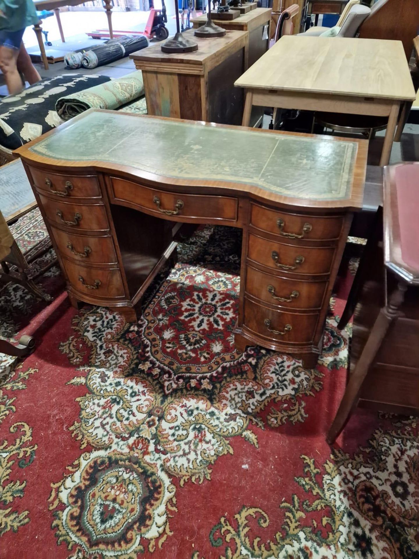 A Georgian Style Burl Walnu Knee Hole Writing Desk The Shaped Leather Inset Top Raised Above A