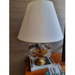 An antique Mid-20th Century Brass And Czech Glass Beaded Fruit Basket Form Lamp. This Brass Table