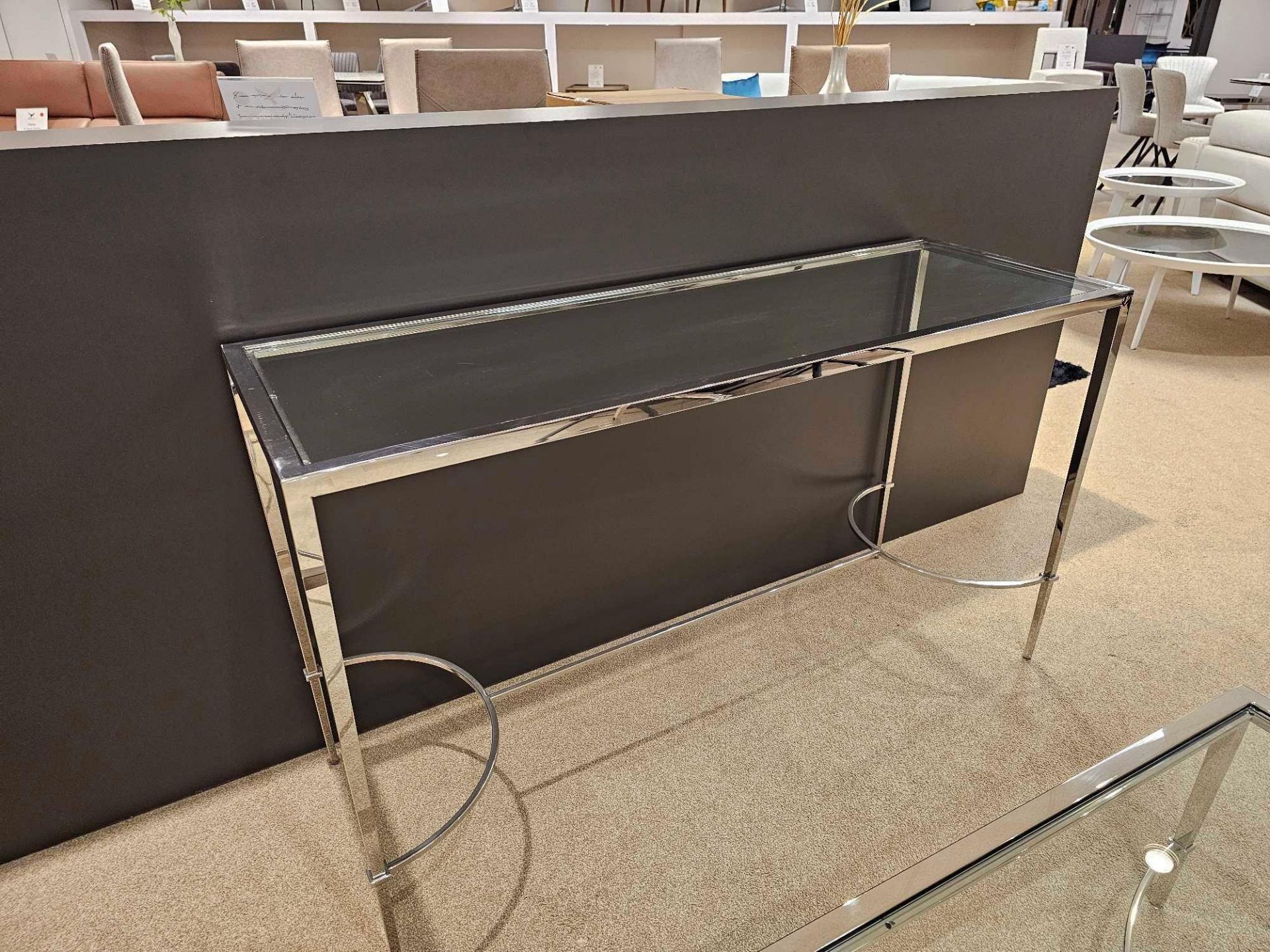 Tokyo Console Table by Kesterport The Tokyo console table with its clear glass top and a refined