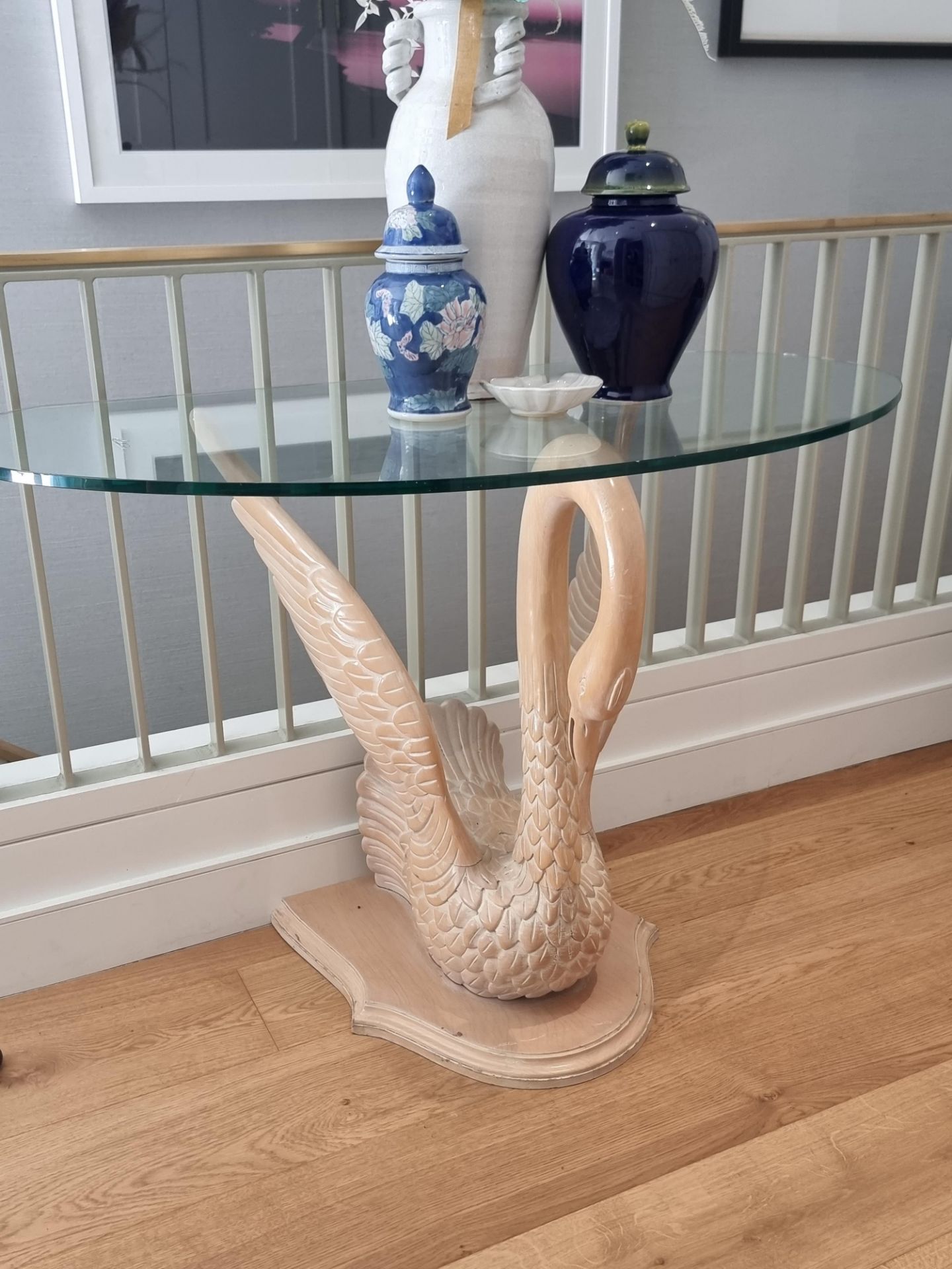 Swan Table Crafted In A Decadent Hollywood Regency Styling An intricately carved swan sculpture