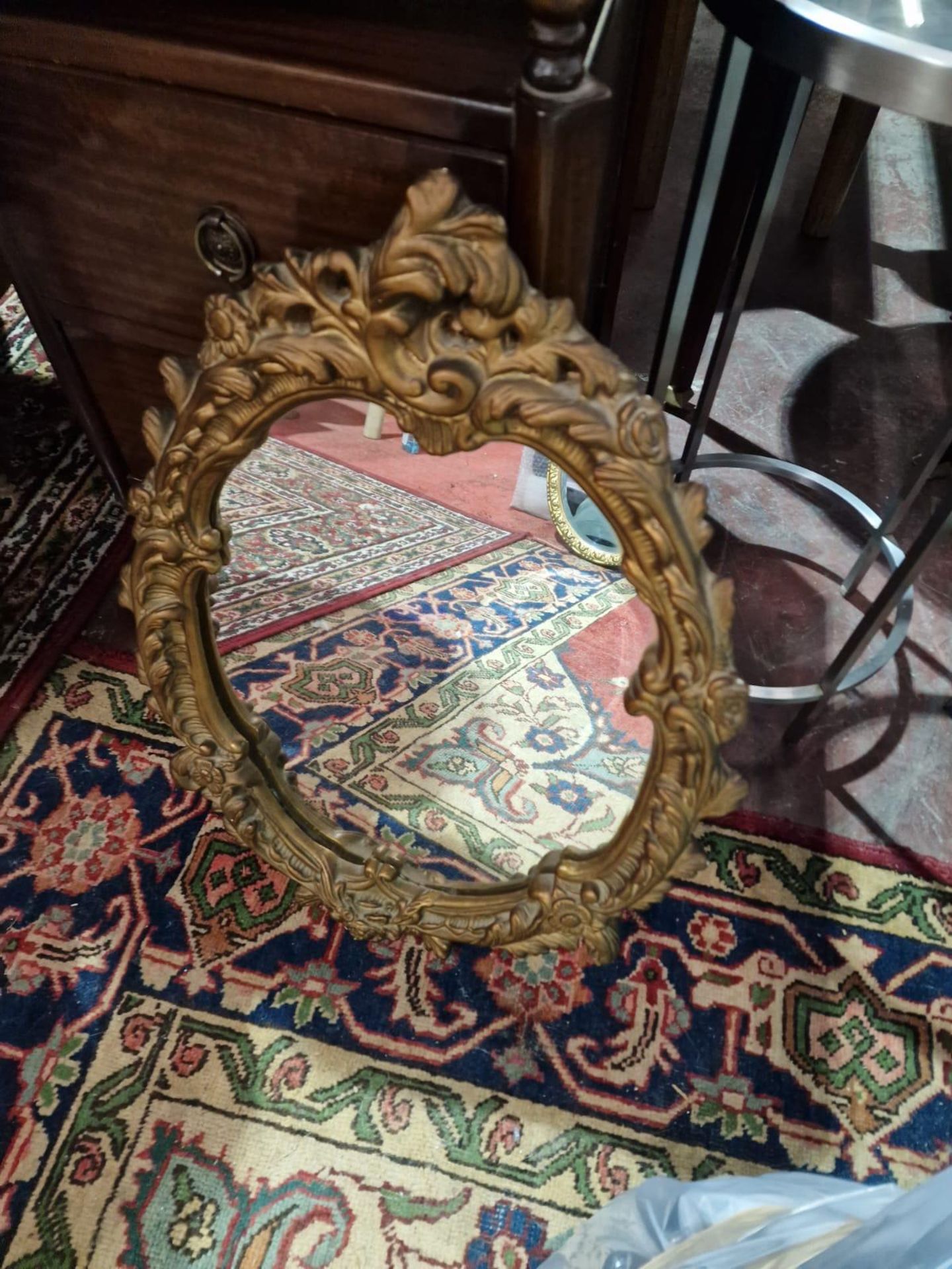 French Style Oval Gold Ornate Wall Mirror Complimenting The Ornate Designs Beautifully Well, The