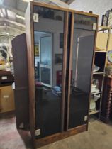 A Tall Double Glass Door Storage Cabinet 10 Cubby Shelfs Internally Behind Smoked Glass Doors 100