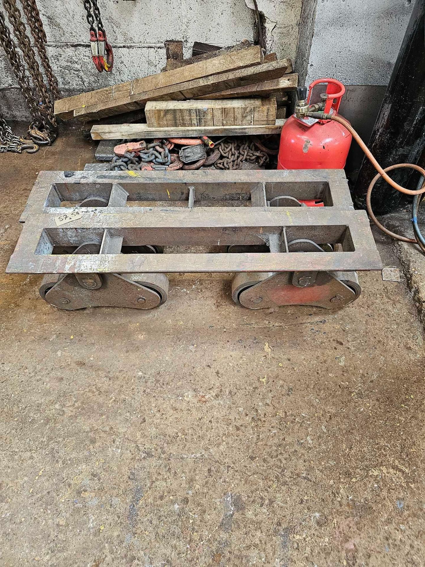 A Pair Of Cast Iron Roller Dolly Skates 120 x 27 x 38cm