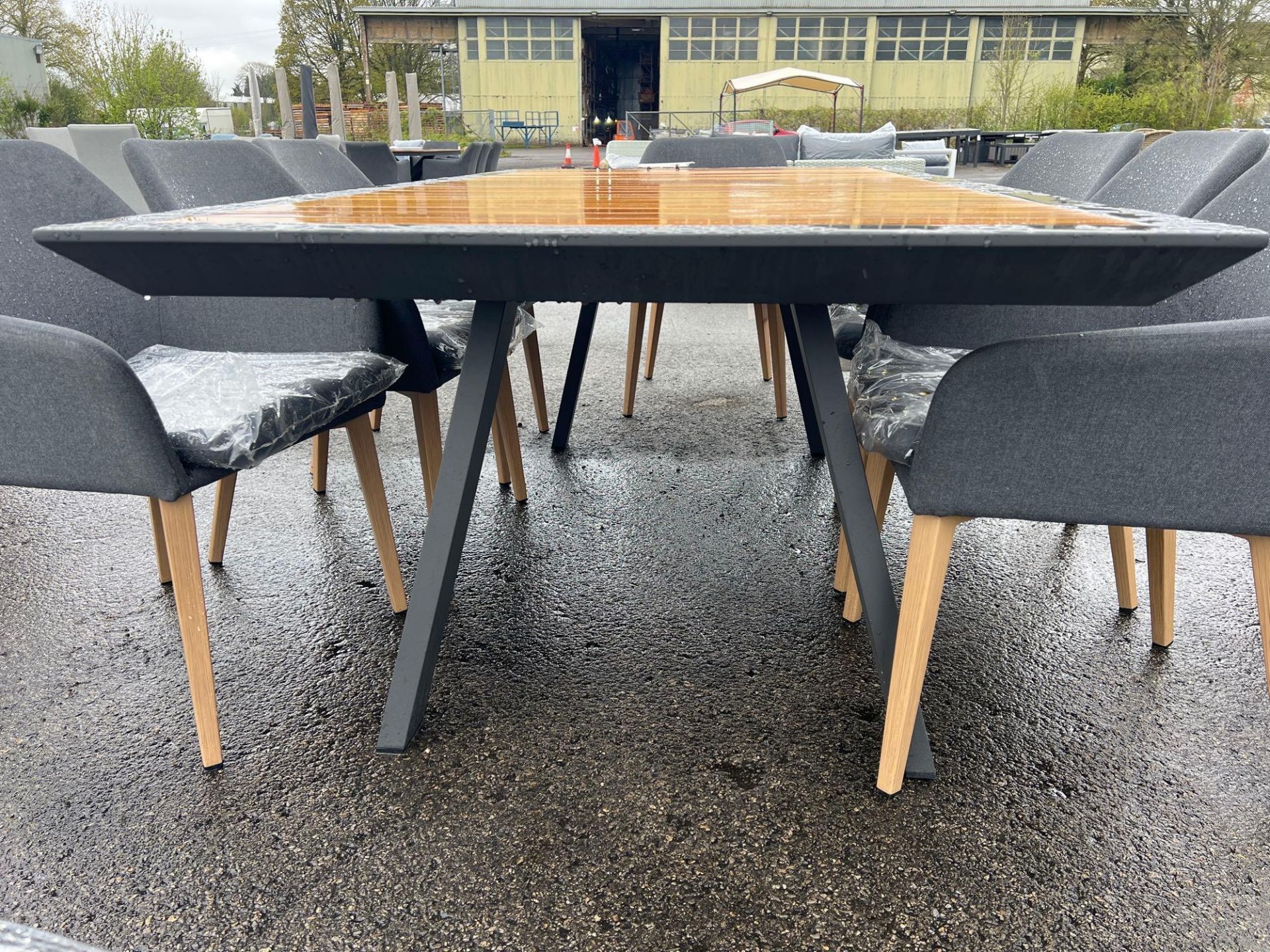 A110 Entesi 210 x 110cm Teak Table with 8 x Fabric Chairs - Image 4 of 5