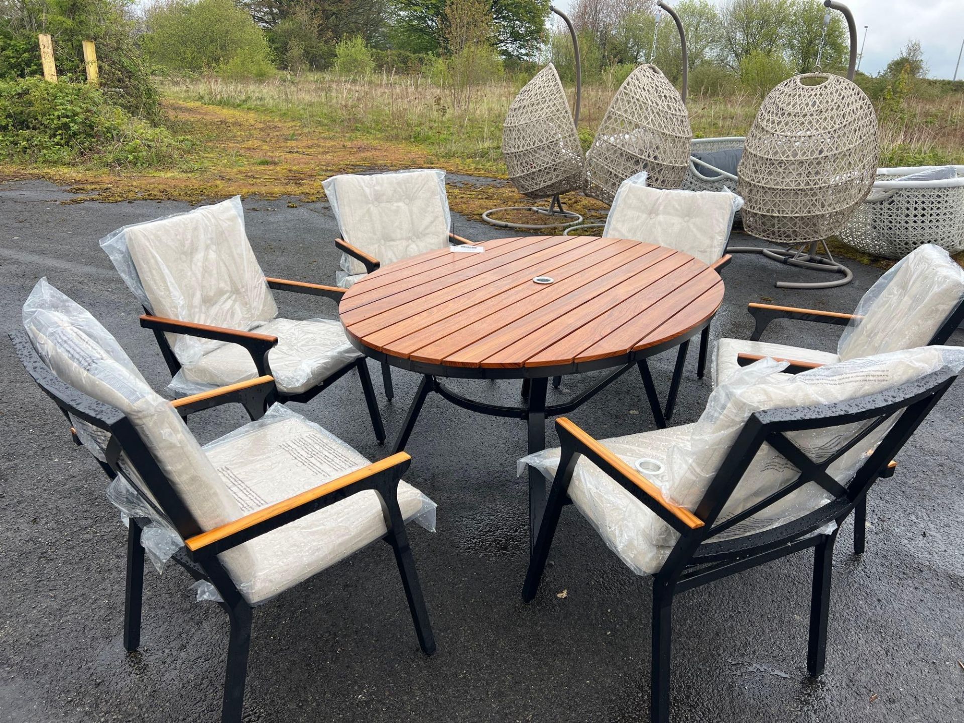 A130 Teak Topped Elliptical Table with 6 x chairs.