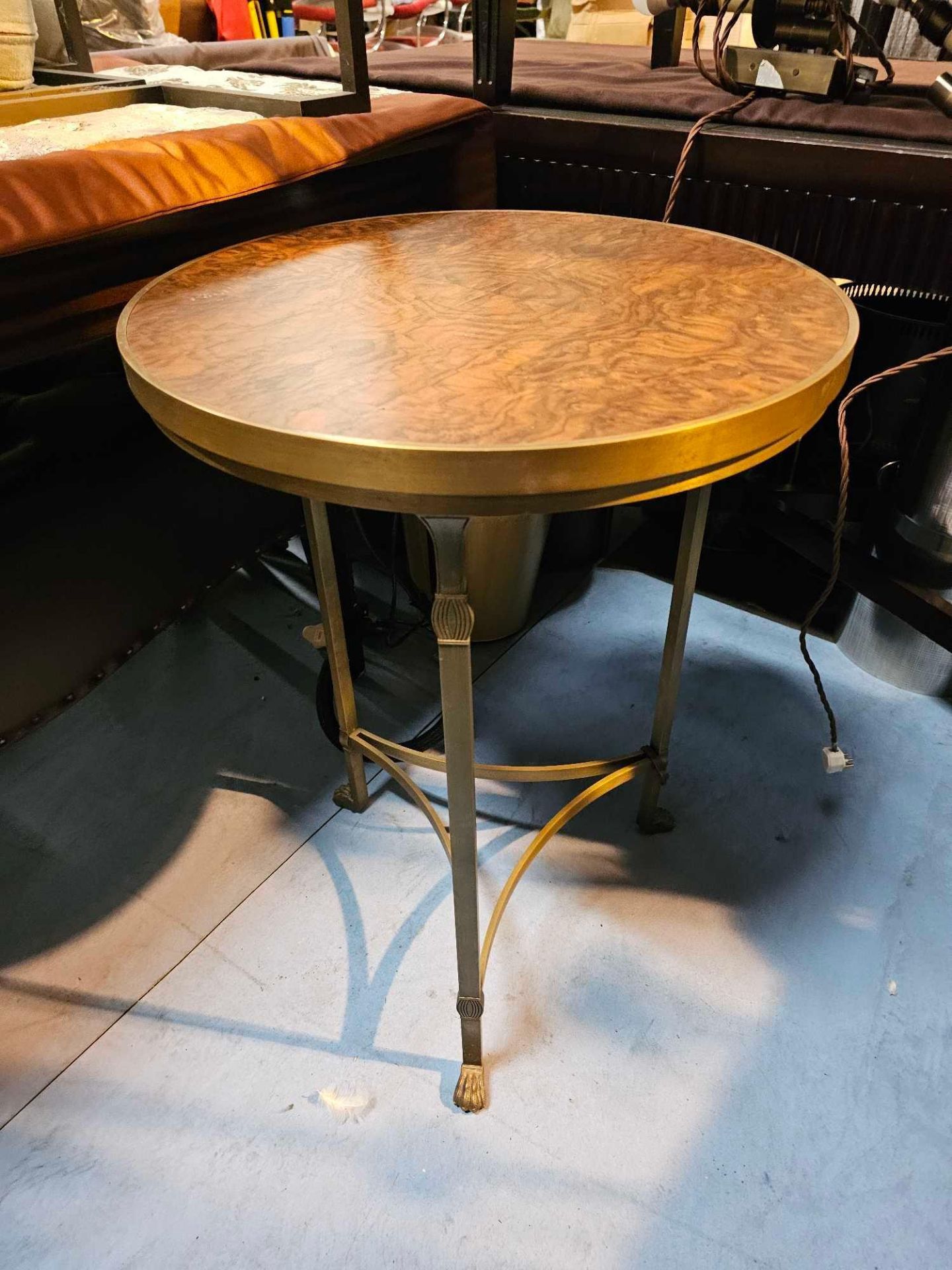 A Bronzed Metal Figured Mahogany Top Side Table Raised On Triform Base Terminating In Hairy Paw