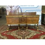 A Walnut And Parcel-Gilt Sideboard, Continental Possibly Italian The Top With A Panelled Back Rail