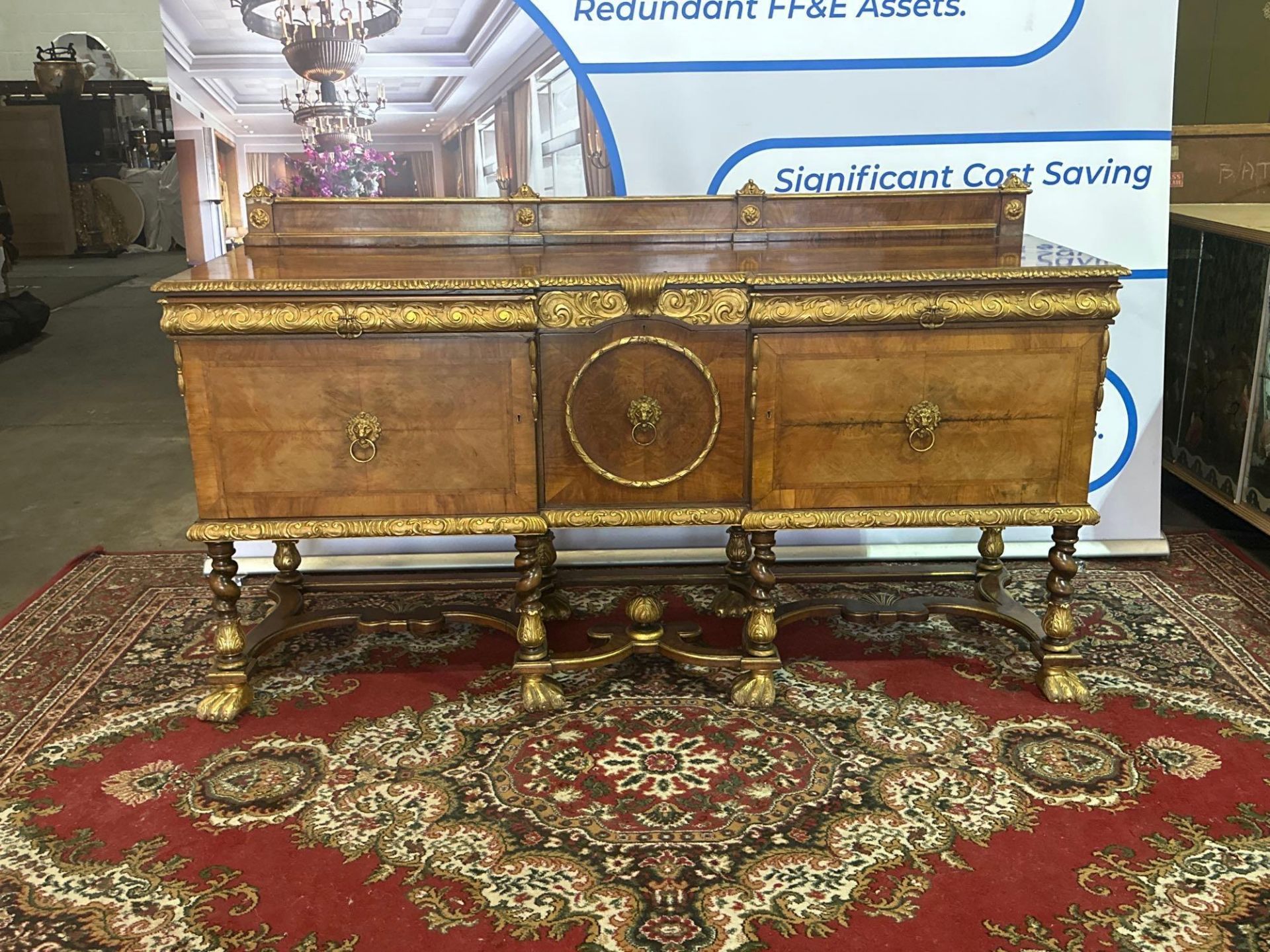 A Walnut And Parcel-Gilt Sideboard, Continental Possibly Italian The Top With A Panelled Back Rail