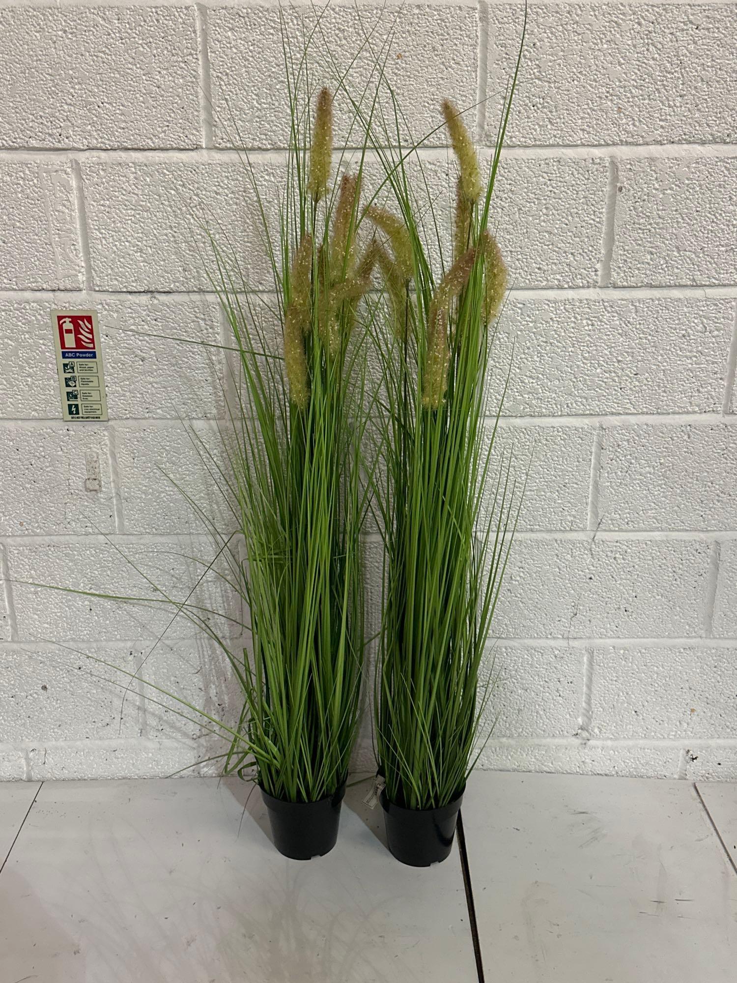 A Pair Of Faux Plants 130cm