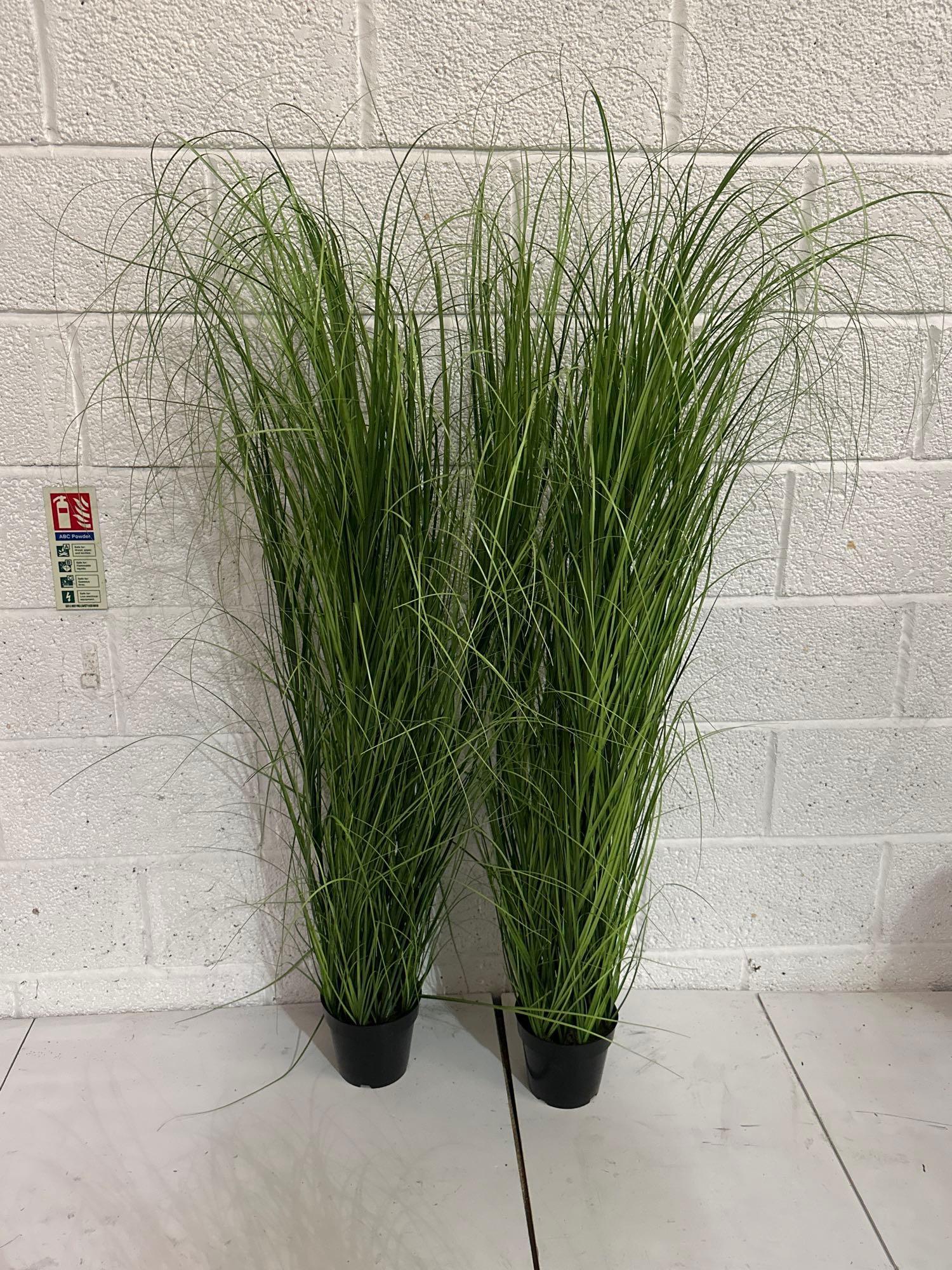 A Pair Of Faux Plants 140cm