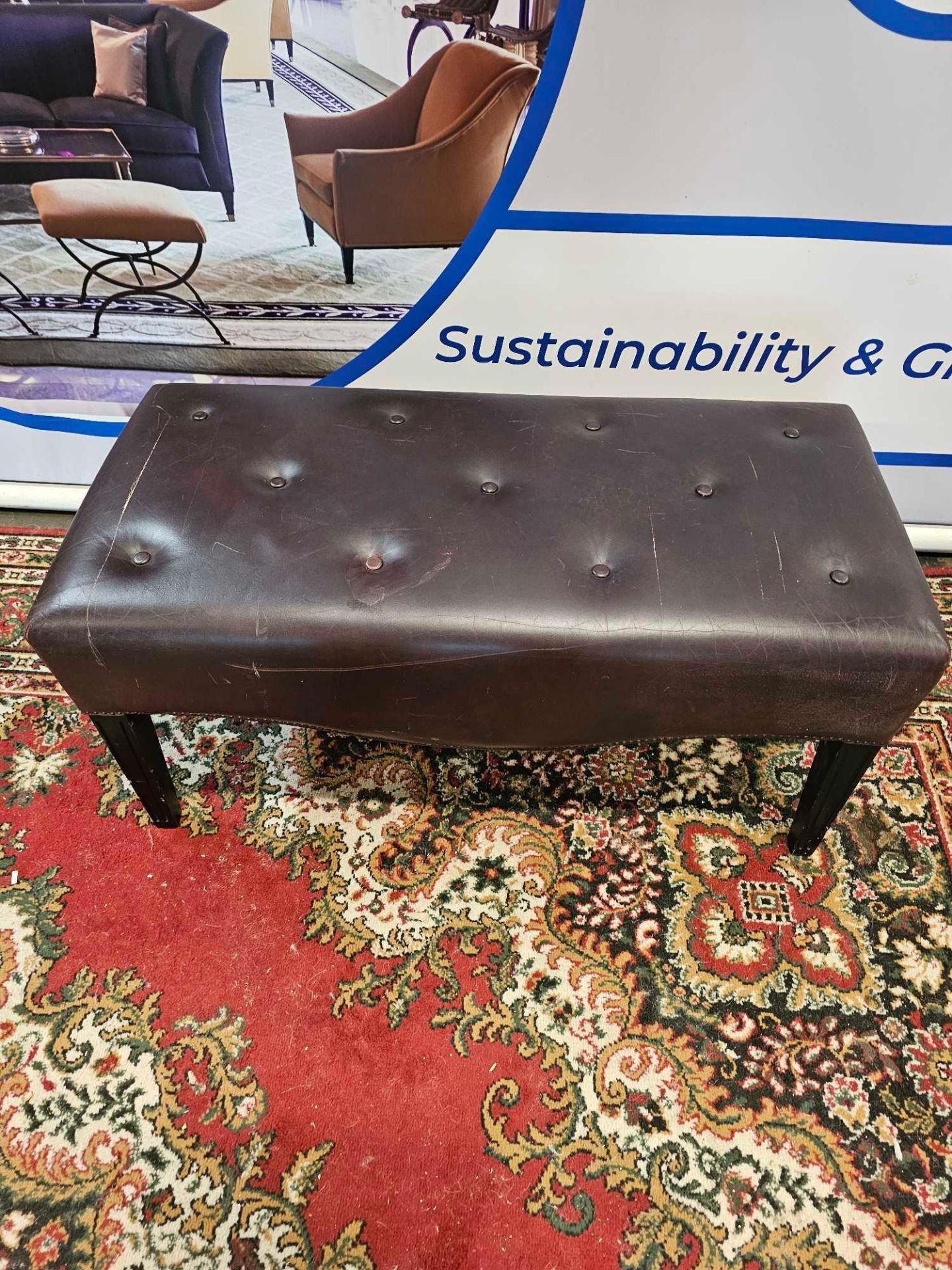 A Tufted Leather Dressing Bench On Hardwood Frame With Scroll Apron In Antique Brown Leather 100 x