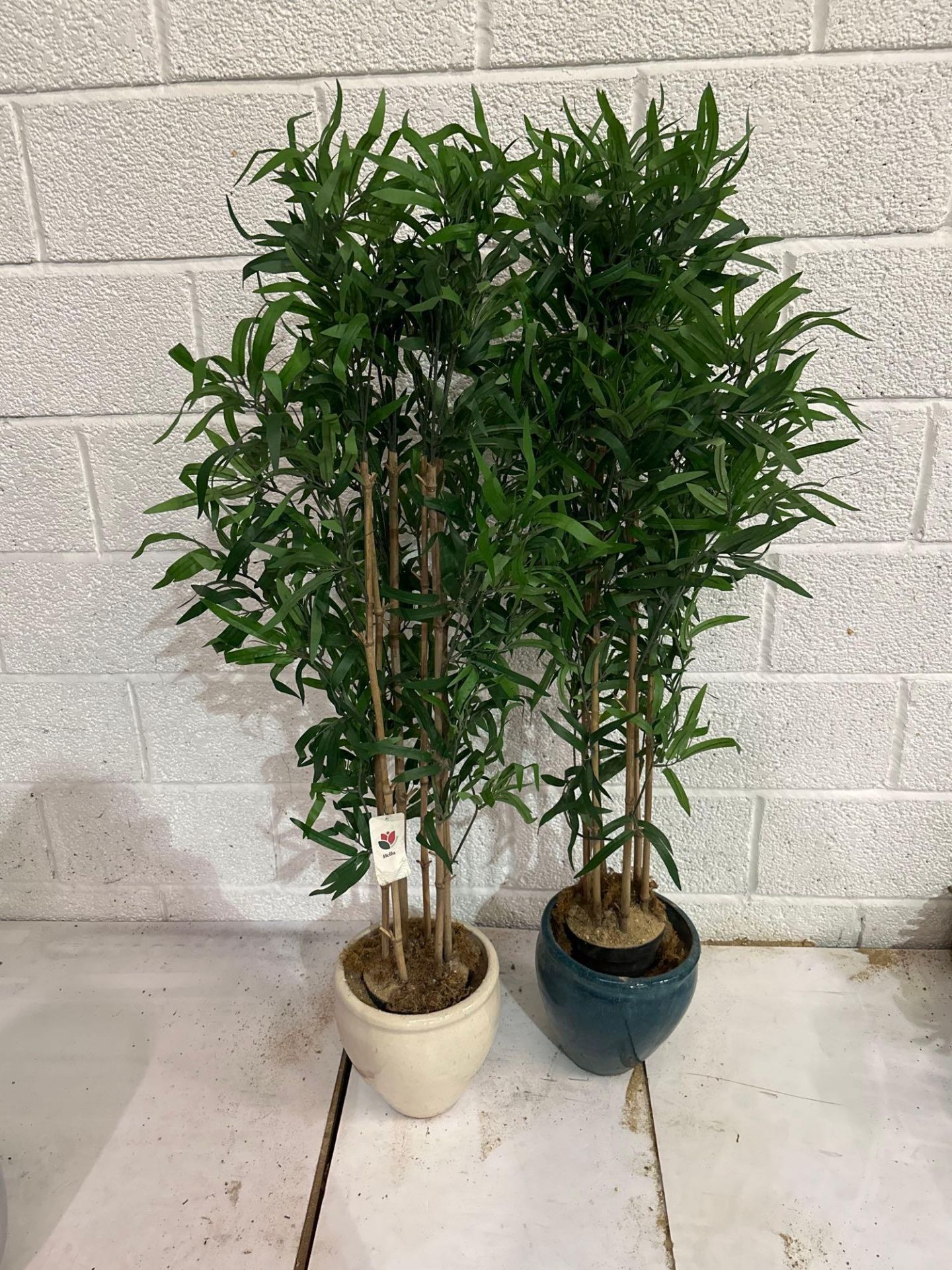 A Pair Of Faux Bloomin Artificial Plants In Pots 140cm