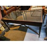 A Large Centre Table With A Black Polished Stone Top Insert Above A Carved Apron With Central Drawer