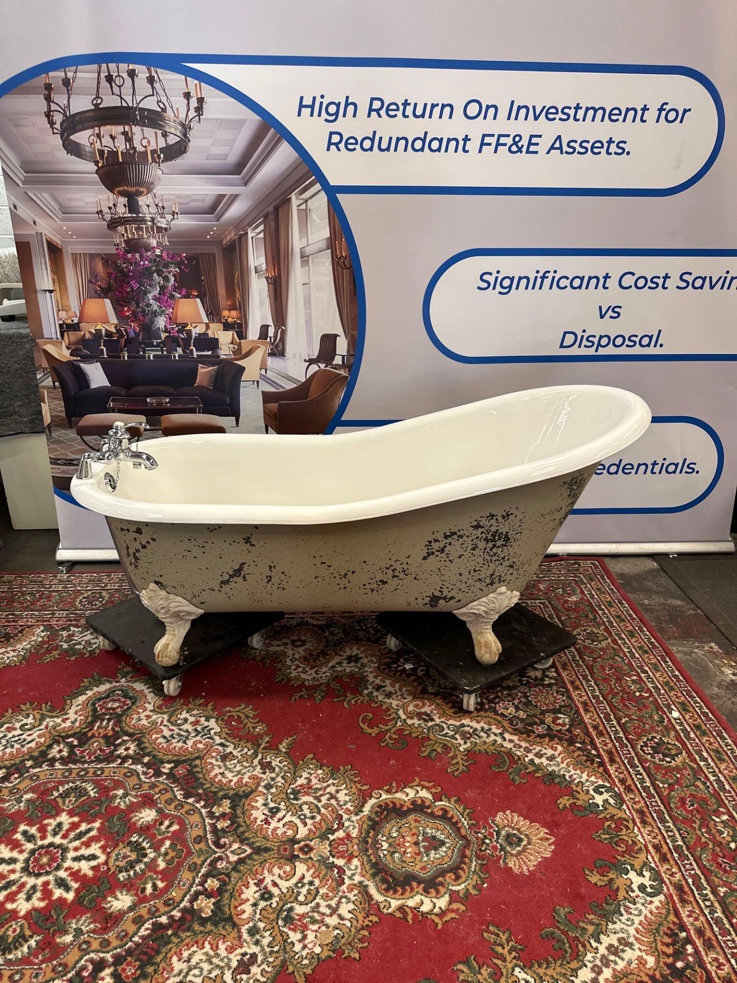 A White Cast Iron Free Standing Roll Top Slipper Bath On Claw And Ball Feet 170 x 57 x 80cm