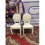 A Pair Of Louis XVI Style Leather White Upholstered Side Chairs With Padded Seat Pad And Backrest
