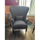 Barrel High Curved Back Wing Chair The Barrel High Curved Back Wing Chair Boasts A Distinctive