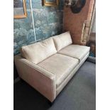 A Two Seater Module Single Left Hand Facing Arm Sofa Upholstered In John Brown Fabric With Piping