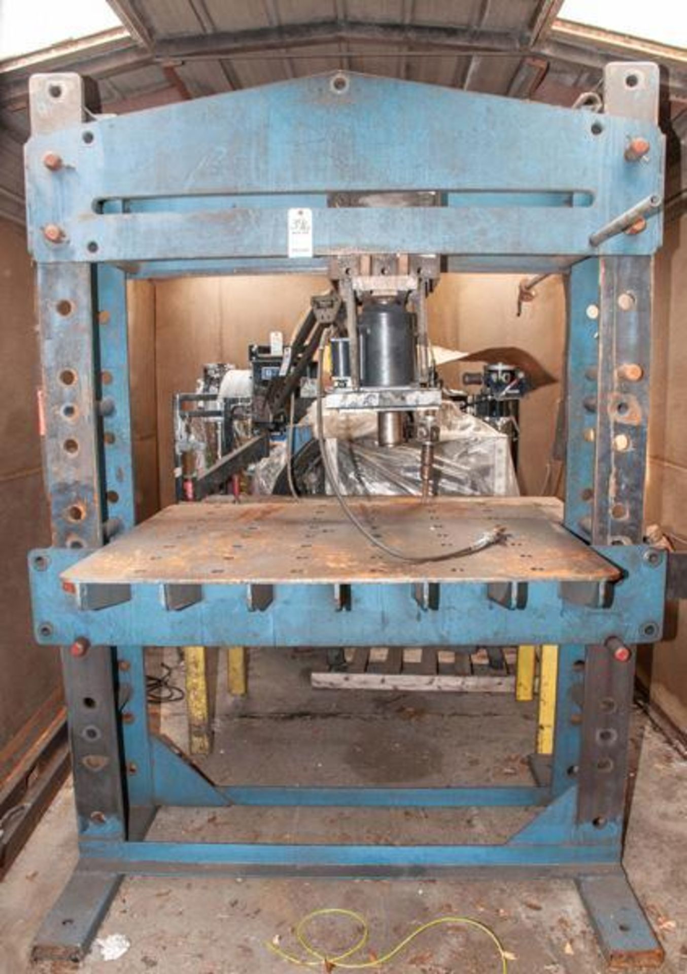Sliding head air/hydraulic press 50 ton cylinder, table approx. 56 x 48" distance between uprights 5