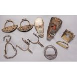 A collection of stirrups and spurs