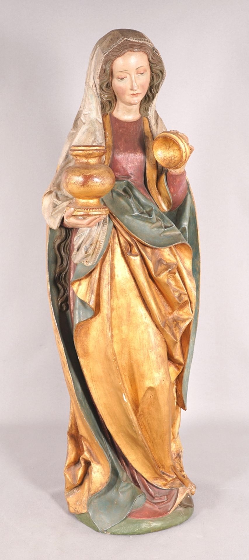 Saint with ointment jar