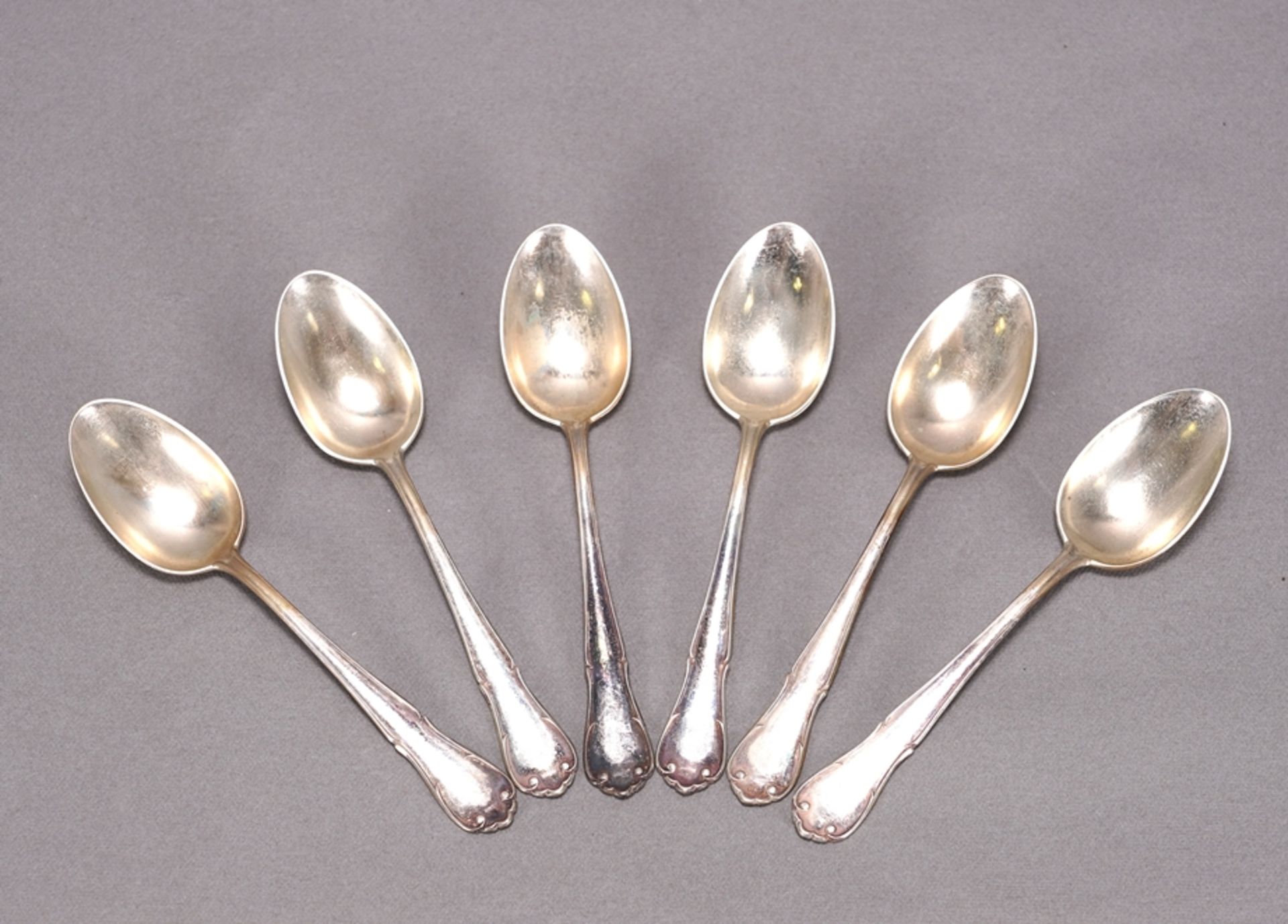 Six dessert spoons