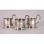 Three silver cups