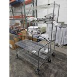 (1) 4-Tier Castered Wire Rack, (1) 2-Tier Castered Wire Rack {Auctioneer's Note}