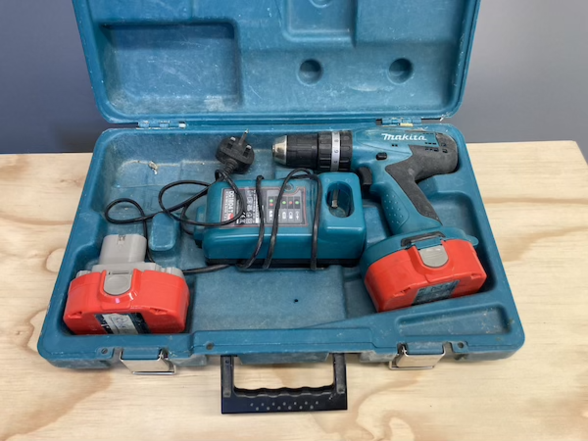 Makita 8391D cordless hammer drill with two batteries