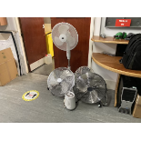 A quantity of pedestal and floor fans with a fan heater, as lotted