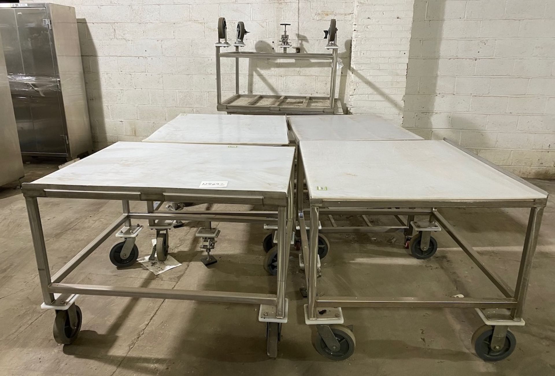 Lot of six Stainless Tables with Plastic Tops