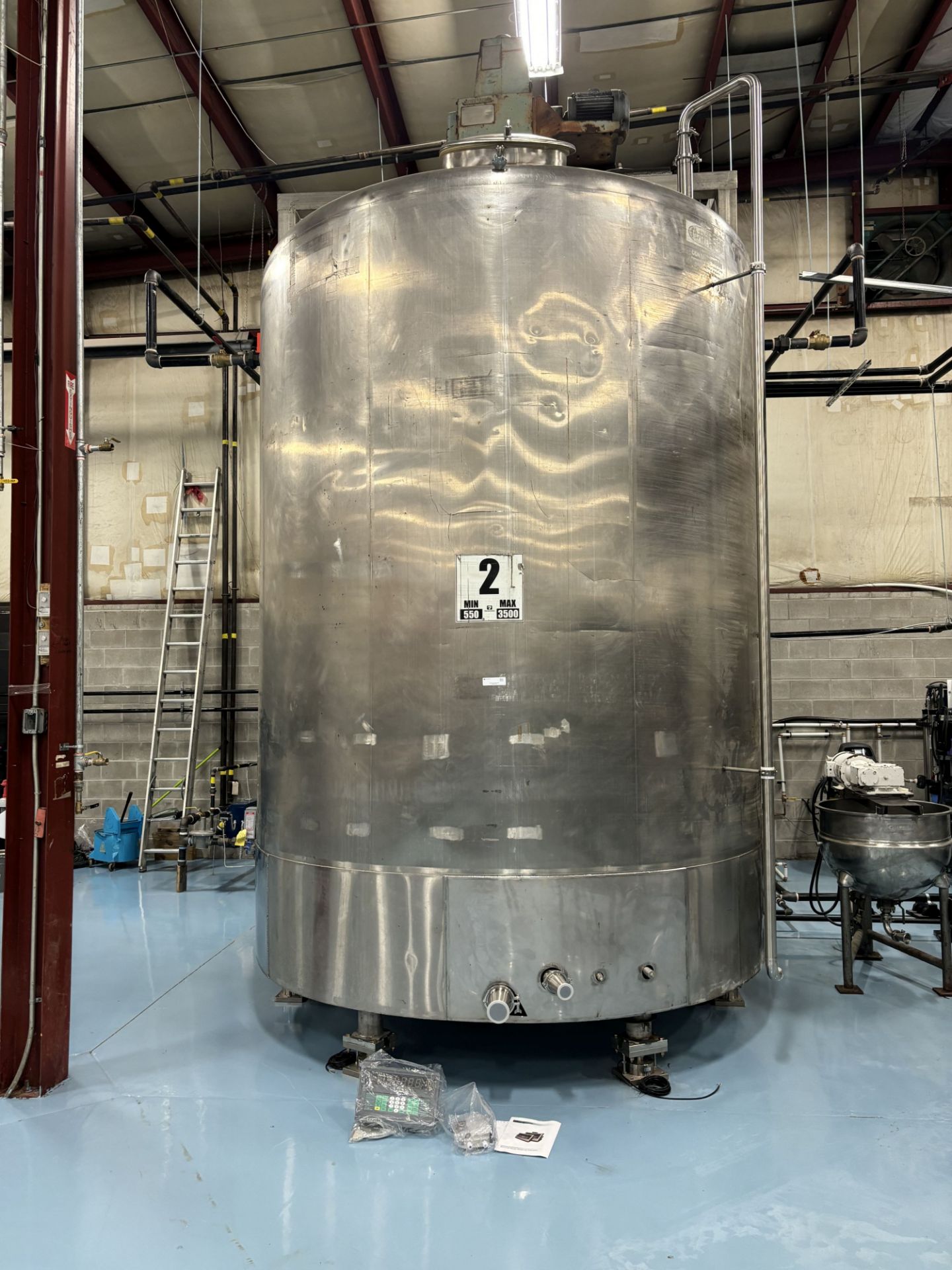 3800 Gallon Stainless Steel Jacketed Tank with Agitator and Load Cells.
