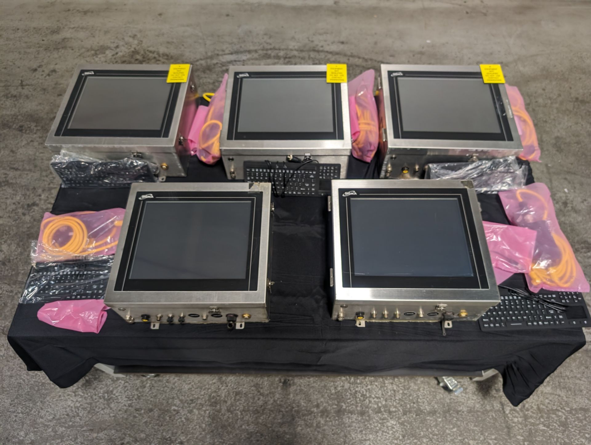 Lot of 5 Sigma display monitors with wires and keyboard