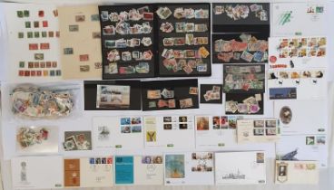 A Large Collection of World Stamps, two bags of used world stamps and a Collection of First Day