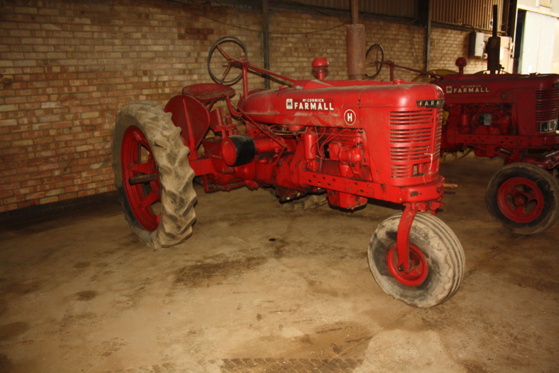(41) McCormick Farmall Model H - HX3 3 wheel petrol tractor Reg JL 7819 Serial No 377867 on farm