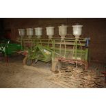 (01) Baselier 4 row rota tiller with crumbler roller and hood, fishtail granular applicator with