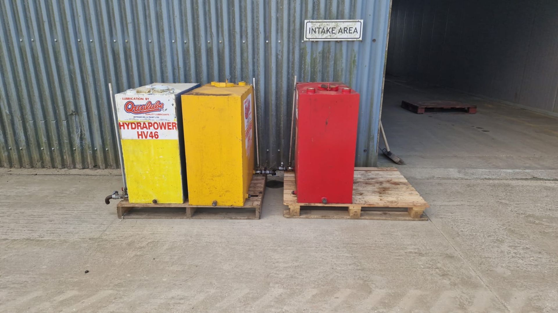 3 x Qualube oil dispenser tanks and other oil tanks