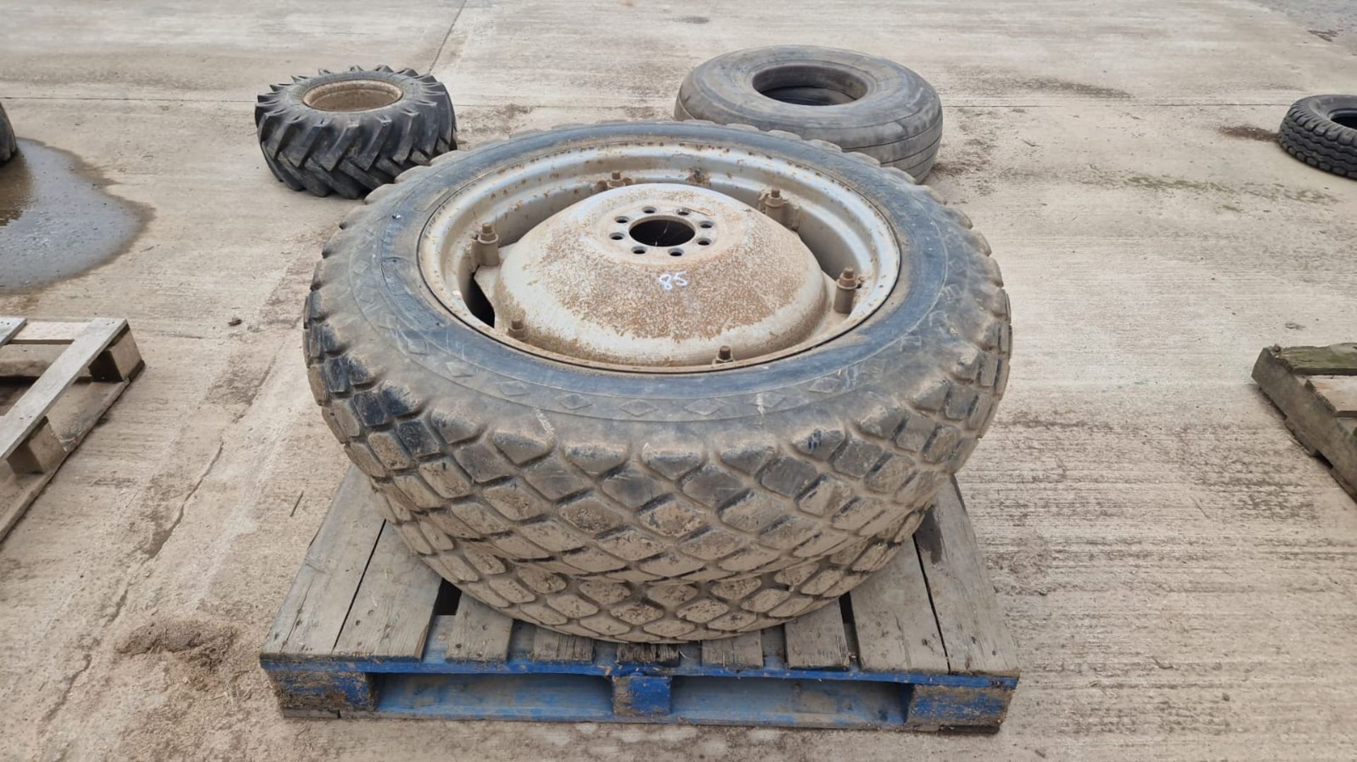 Pair of 11.2/10-28 grass tyres with Massey Ferguson wheel pans