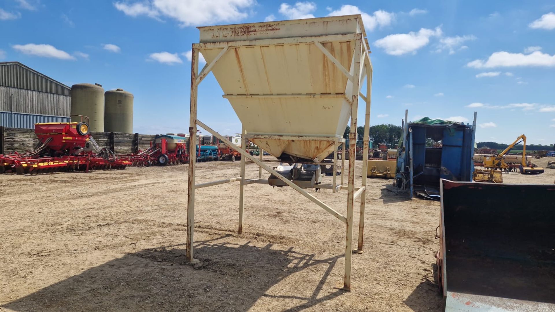 Metal bulk hopper on stand